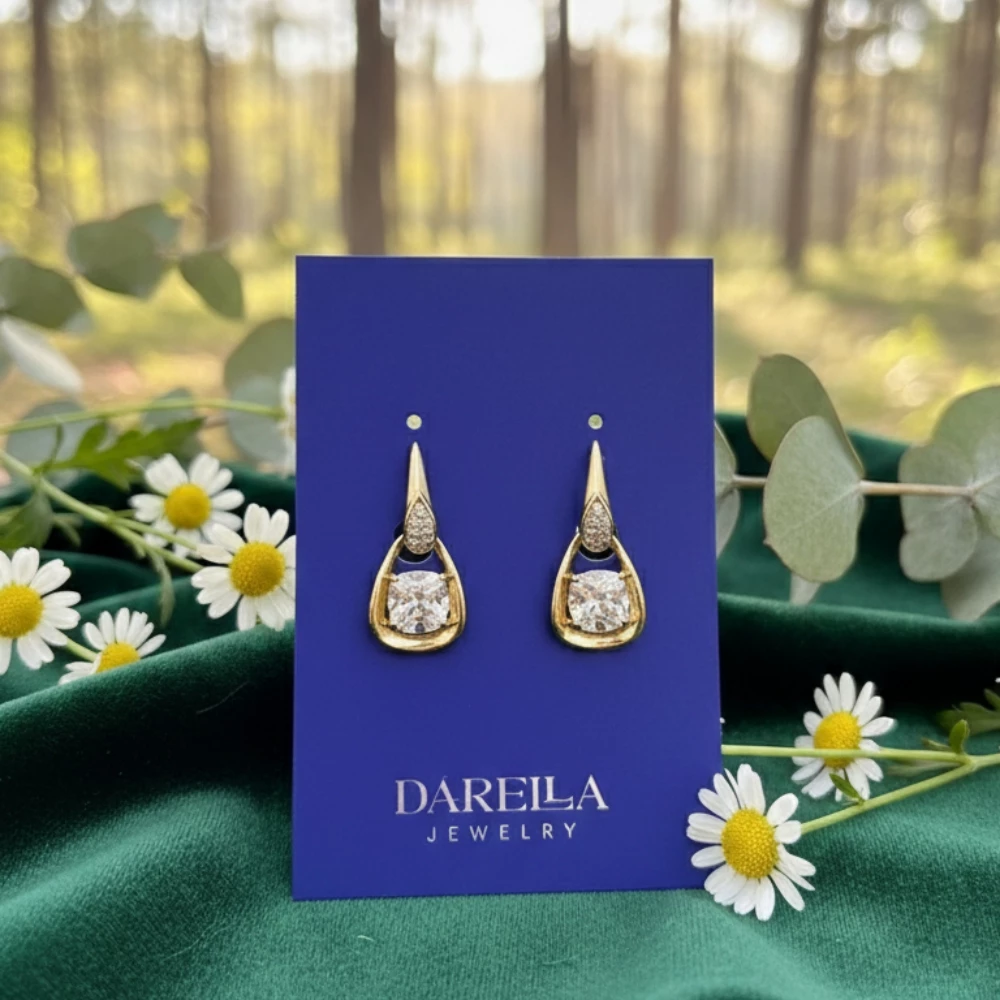 Damlavari kəsimli sirkon daşlı qızılı sırğa